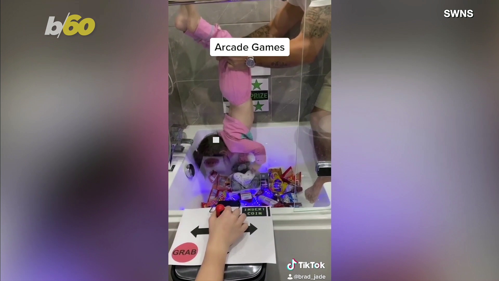 This Dad Turned His Daughter Into a Human Claw ‘ Grabber’ Arcade Machine