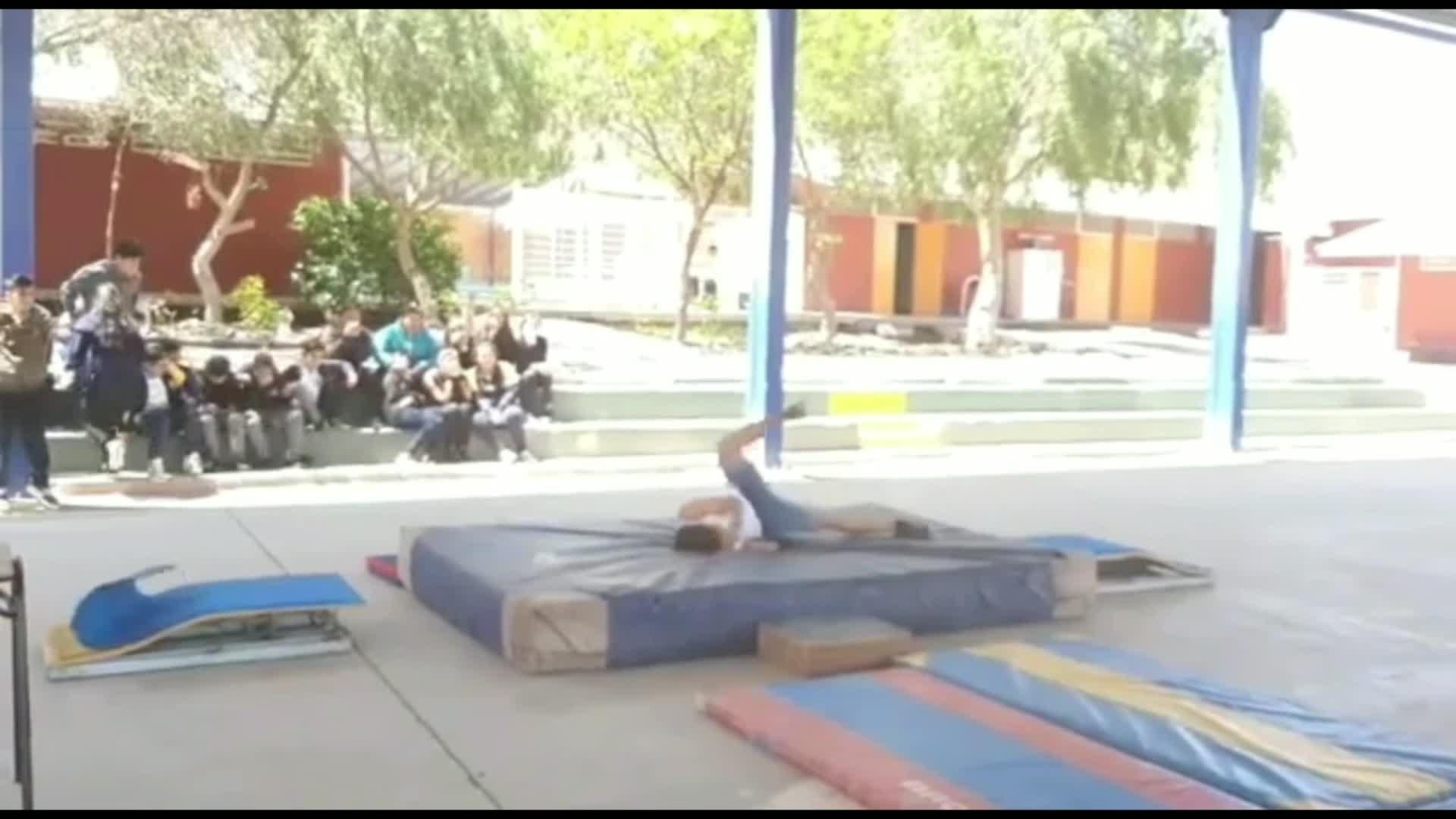 Guy Faceplants on mat While Giving Parkour Demonstration