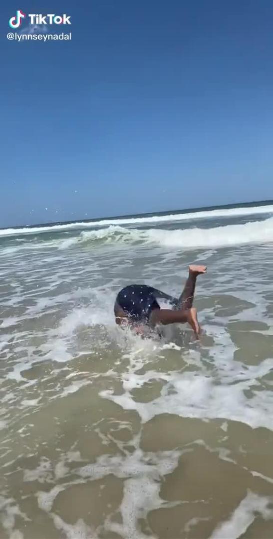 Guy Tries Doing Backflip and Falls Flat on his Face in Water