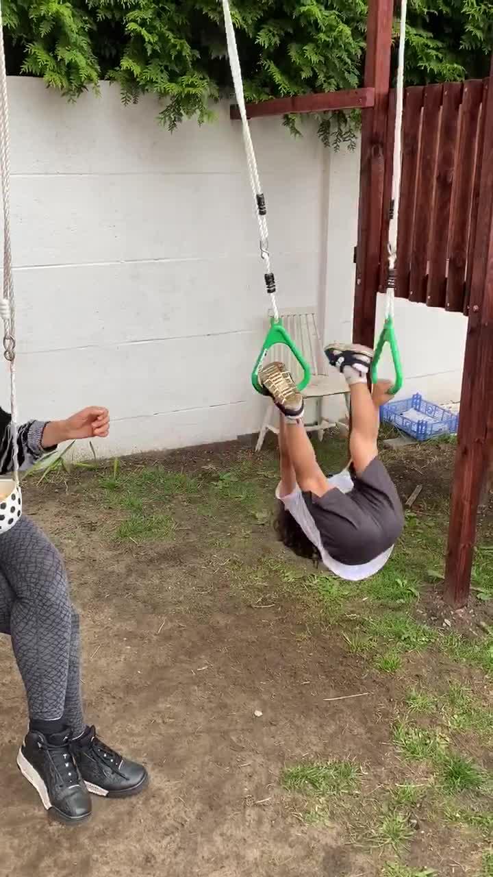 Kid Holding Rope Successfully Manages to do Backflip After Multiple Failed Attempts