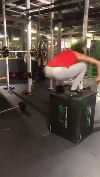Woman Tries to Jump on Top of Box and Falls